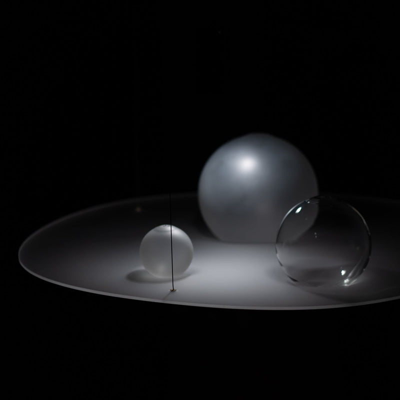 Richard Clarkson Studio Gravity Well Chandelier in the dark